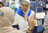 Tiba di Asrama Haji, Jemaah Haji Kloter 11 Disambut Hangat PPIH Debarkasi Palembang